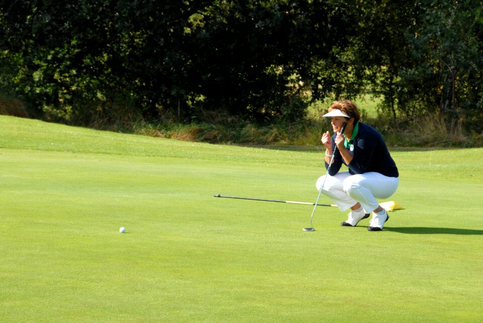 Ball golfer golfing