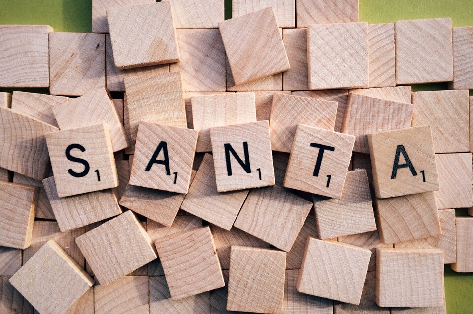 Scrabble letters brown letter