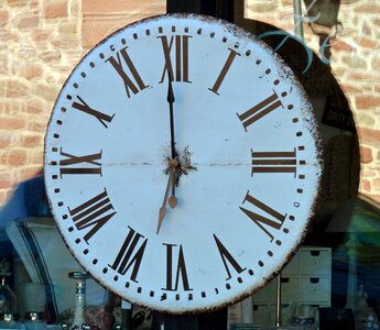 Time indicating time of clock face photo