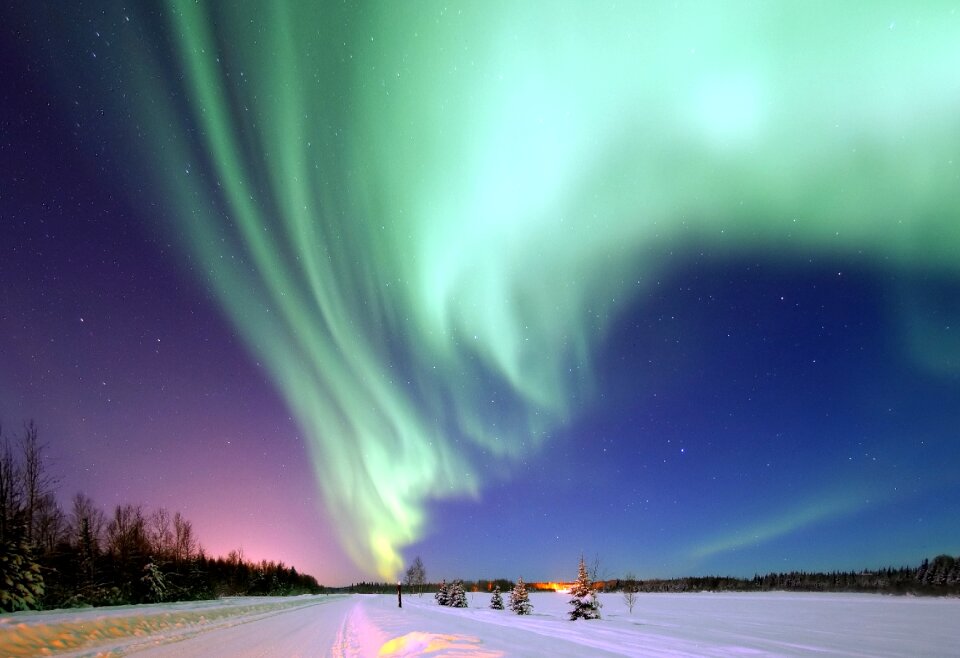 Blue starry sky purple and green aurora