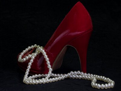 Jewellery high heeled shoe red photo