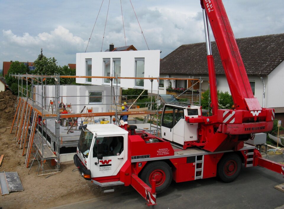 Scaffold construction workers build