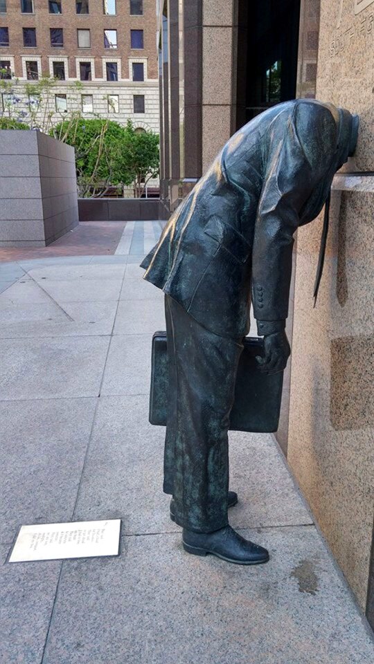 Sculpture city businessman