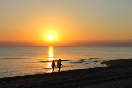 Orange sky night people photo