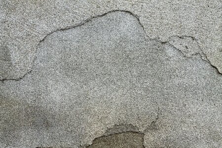 Plaster cracked gray background