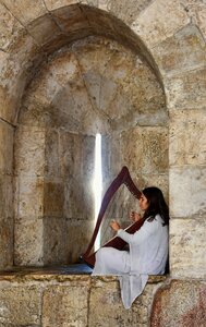 Medieval street musician ramparts photo