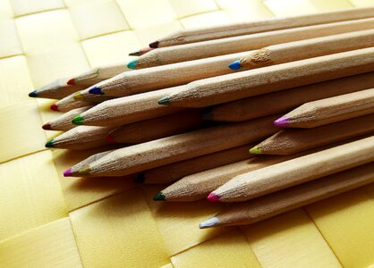 Colour pencils different colored crayons pens photo