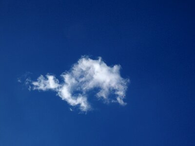 Blue white clouds form photo