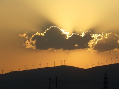 Sunset wind turbine clouds