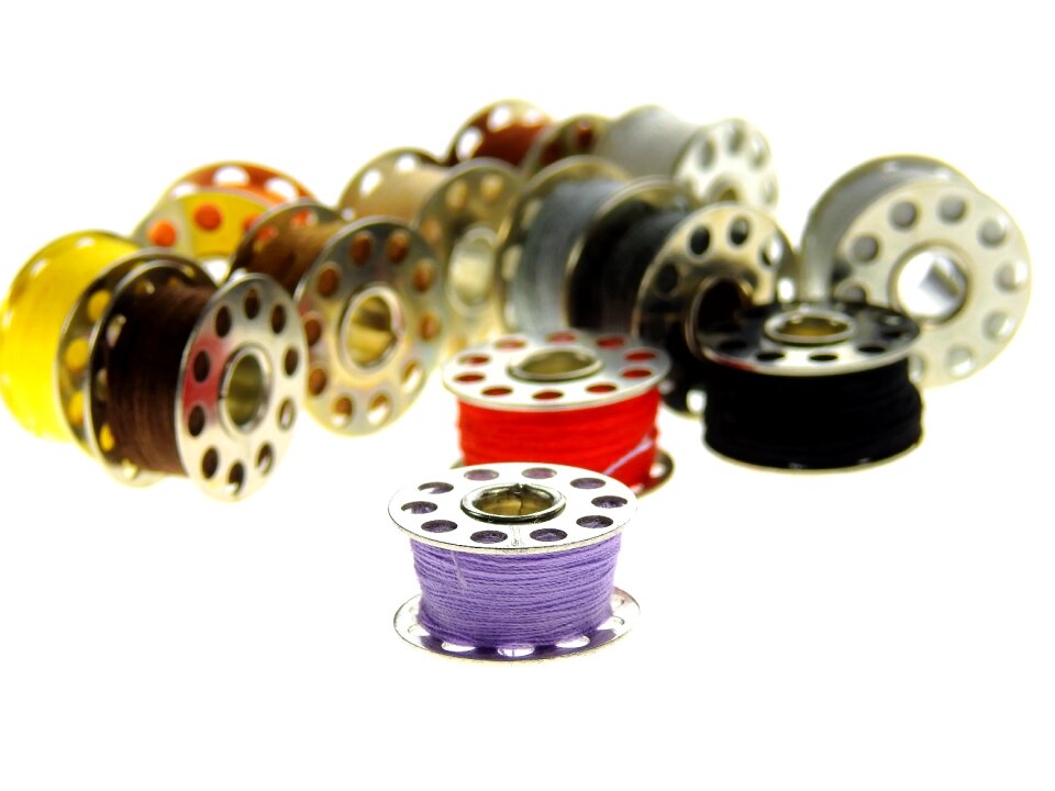 Thread spool colorful sewing thread photo