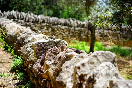 Stone wall dry stone masonry stones photo