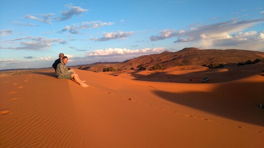 Lying sun sahara desert photo