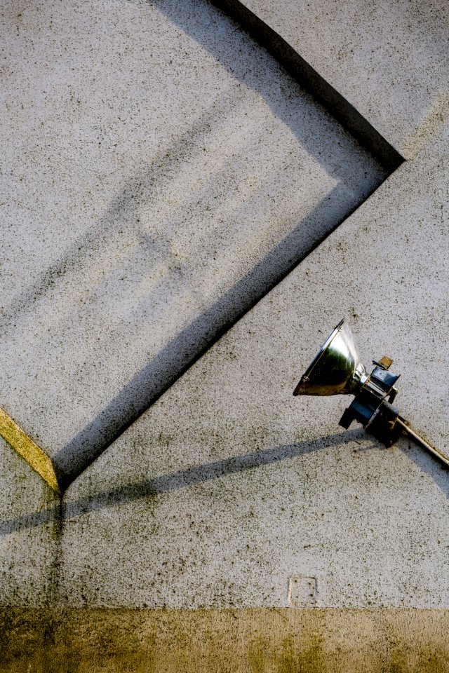 gray stainless steel lamp on gray concrete pavement photo