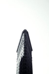 grayscale photography of flat-iron building photo