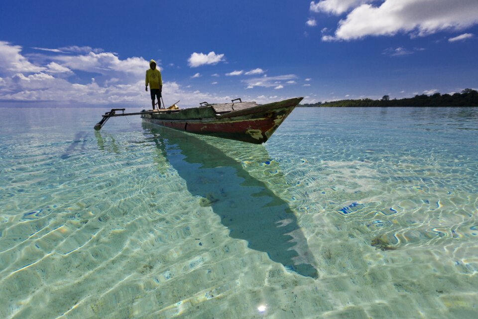 Widi islands fishing boat shallows