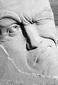Mouth face sand sculpture