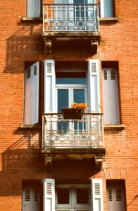 apartment window during daytime photo