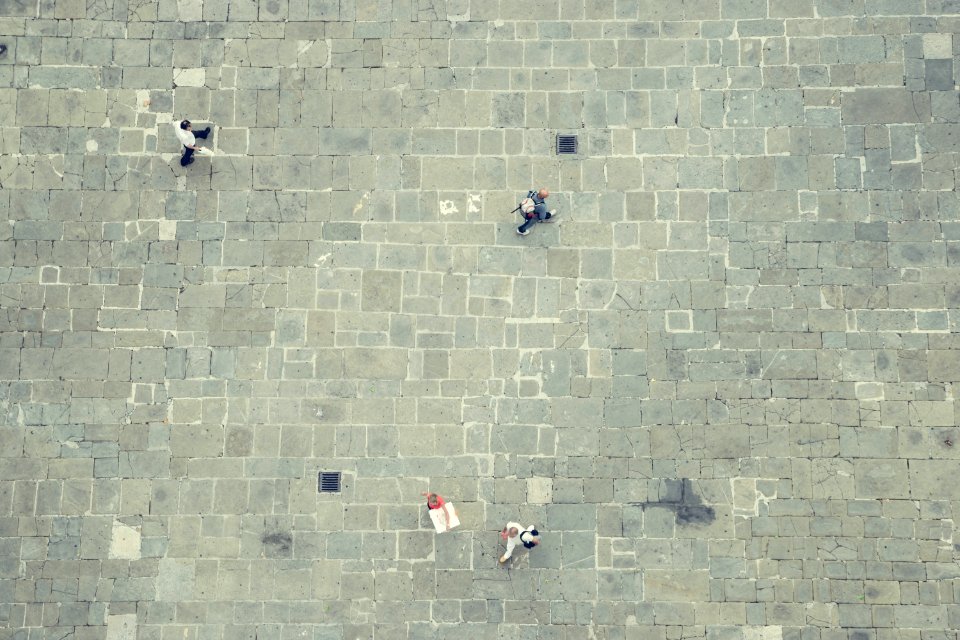 four walking people in top view photography