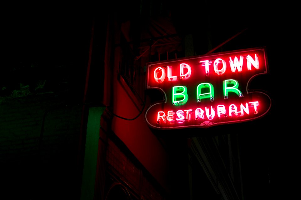 turned on Old Town Bar restaurant neon light signage