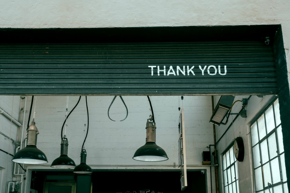 assorted pendant lights hanging on ceiling