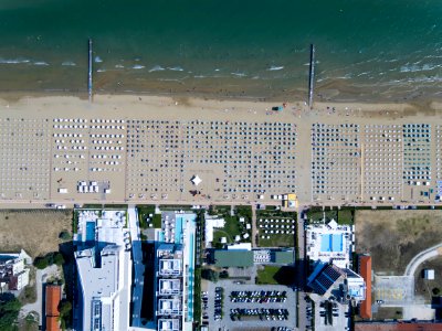 bird's eye photography of buildings near body of water