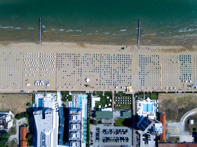 bird's eye photography of buildings near body of water photo