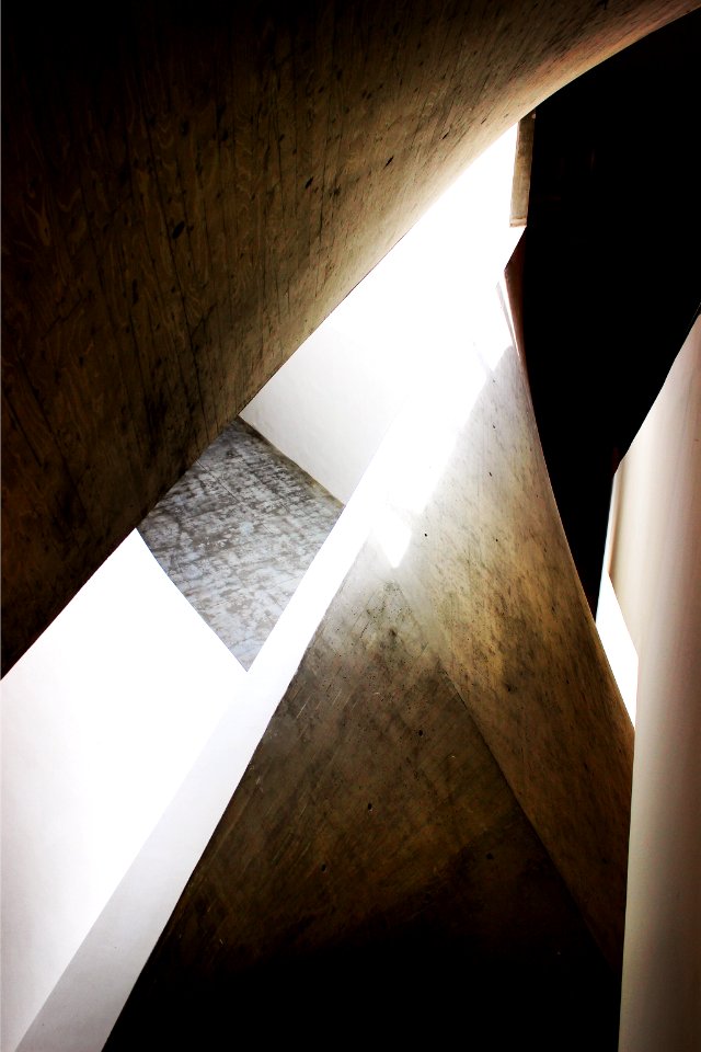 Edges of rocky architectural walls and designs reflecting light and casing shadows