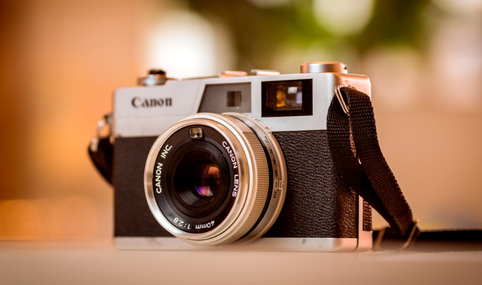 depth of field gray and black Canon film camera photo