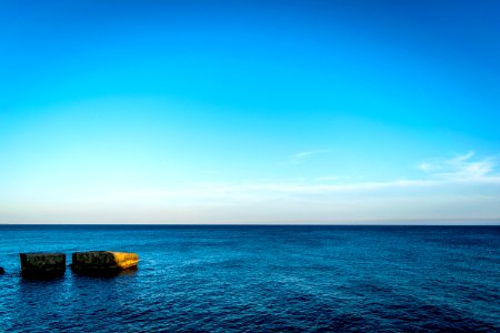 blue ocean water under blue sky photo