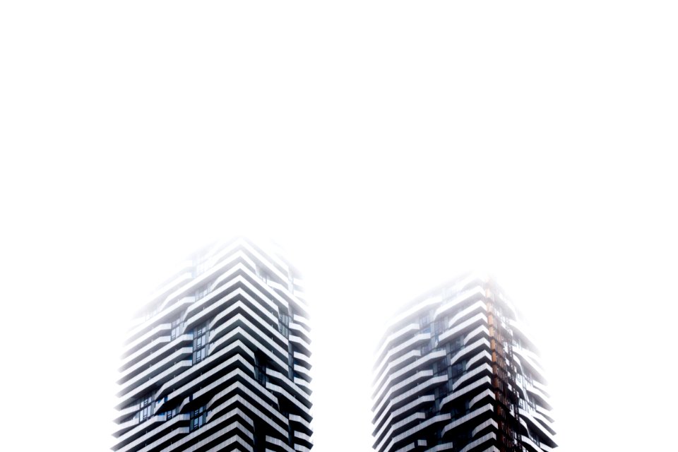 low angle photography of two high rise buildings