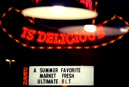 red and white UNKs coffee neon signage