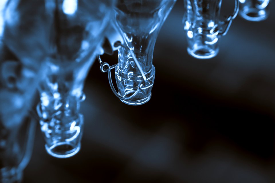 macro shot photography of clear glass bottles