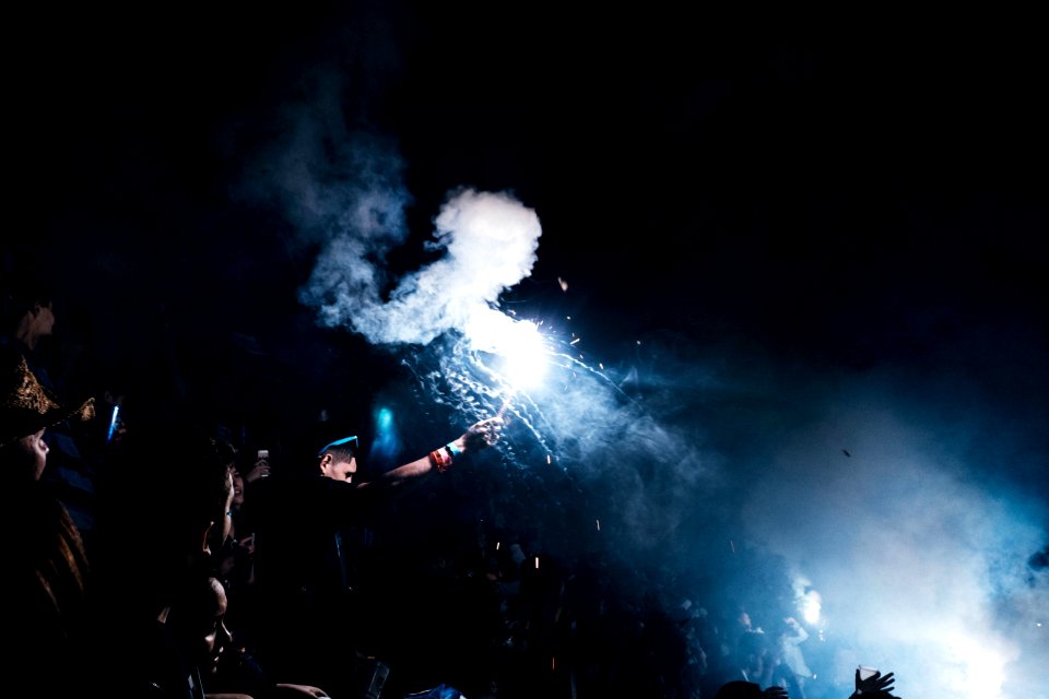person playing with fireworks