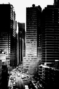 grayscale photo of high-rise buildings photo