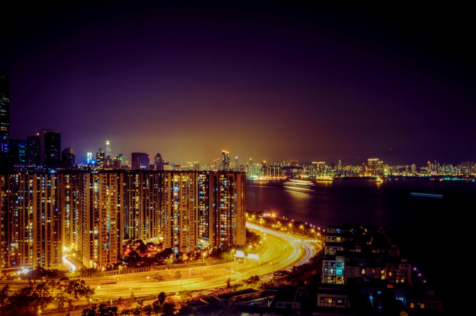 photo of high rise buildings near body of water
