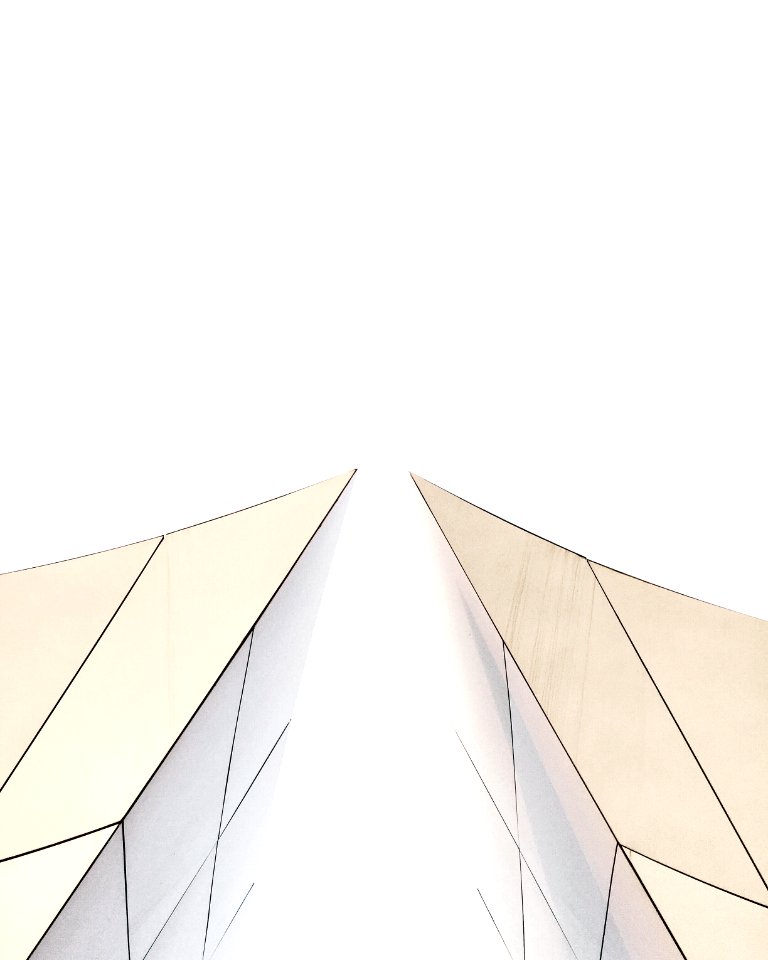 two white buildings about to touch each other's peak