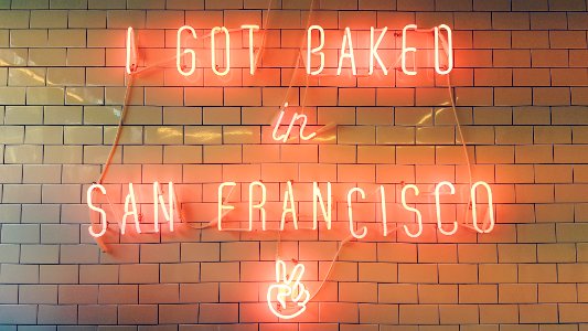 turned on neon light signage