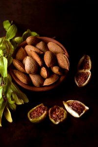 brown ceramic pot with nuts