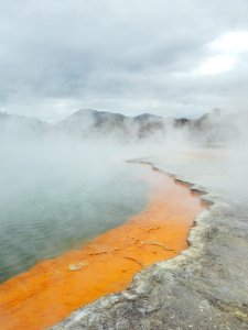 body of water near mountain