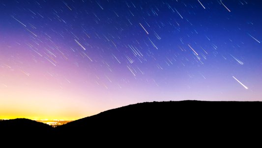 time lapse photography of shooting stars