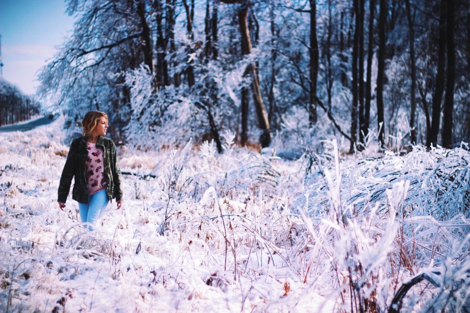 woman walking around forest