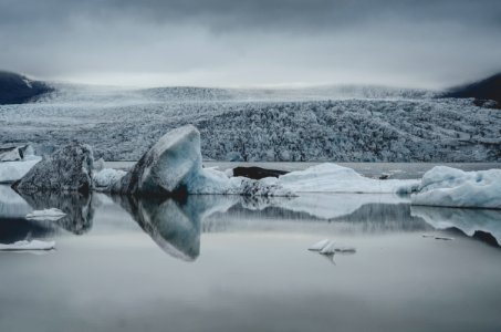 ice berg on body of water photo