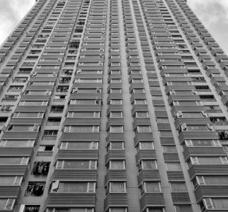 grayscale photo of high-rise building photo