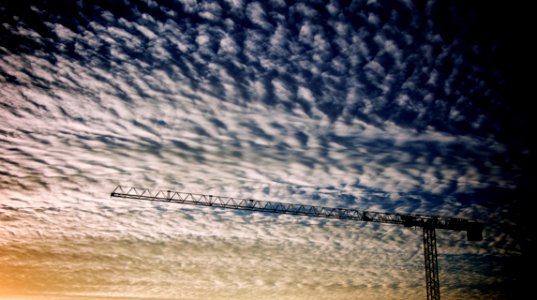 photo of crane and white clouds