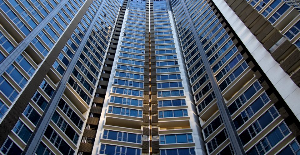 architectural photography of blue and gray skyscraper photo