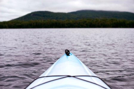 point of view photography of kayak on lake photo