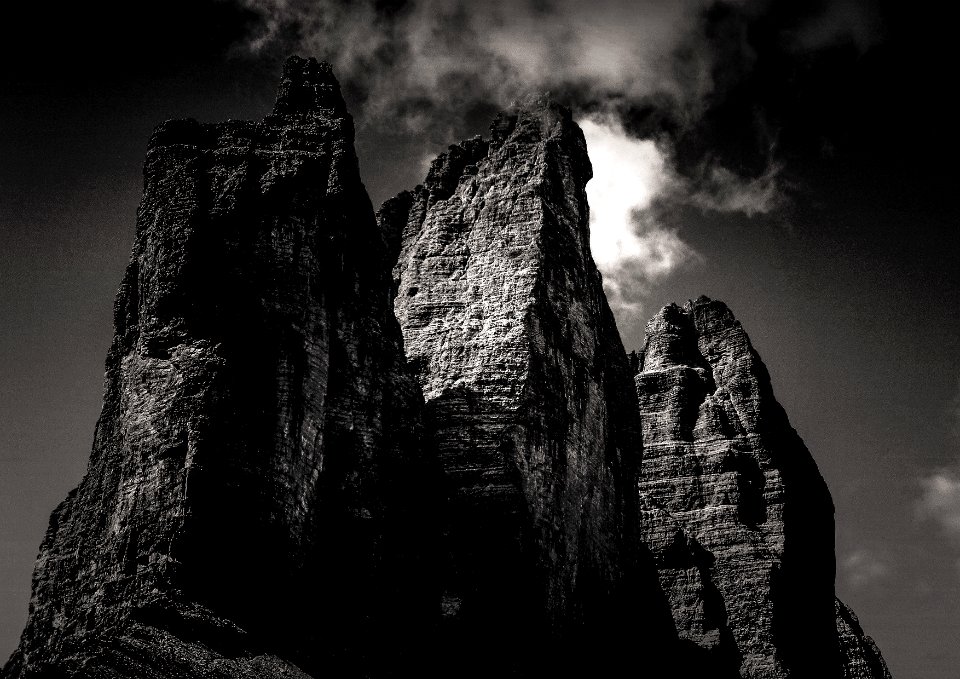 grayscale photo of rock formation