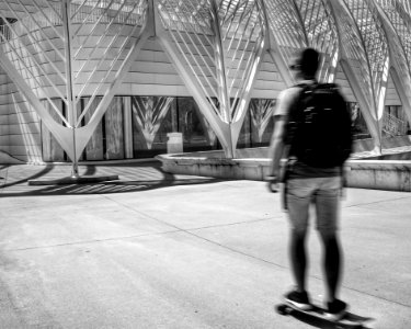 man standing on skateboard photo