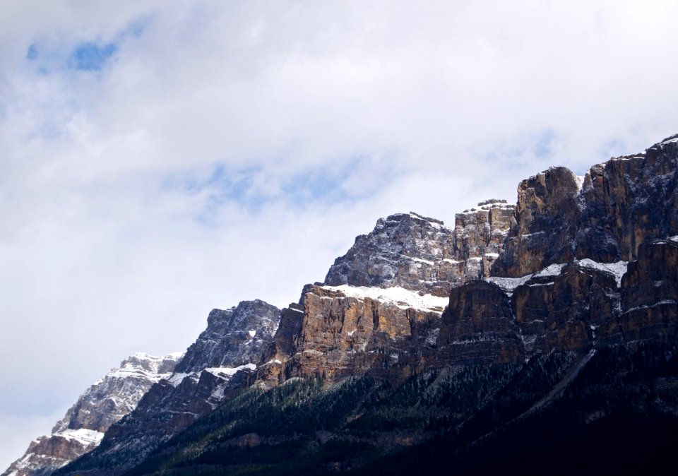 brown mountain under gray sky during daytime