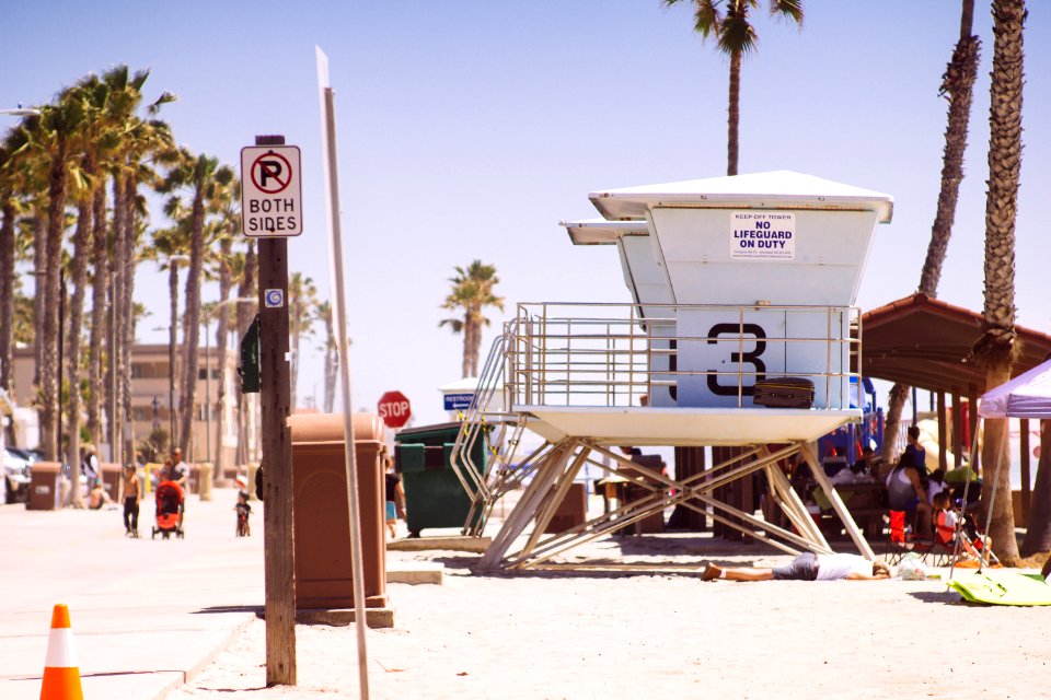 lifeguard houses under bright skty photo